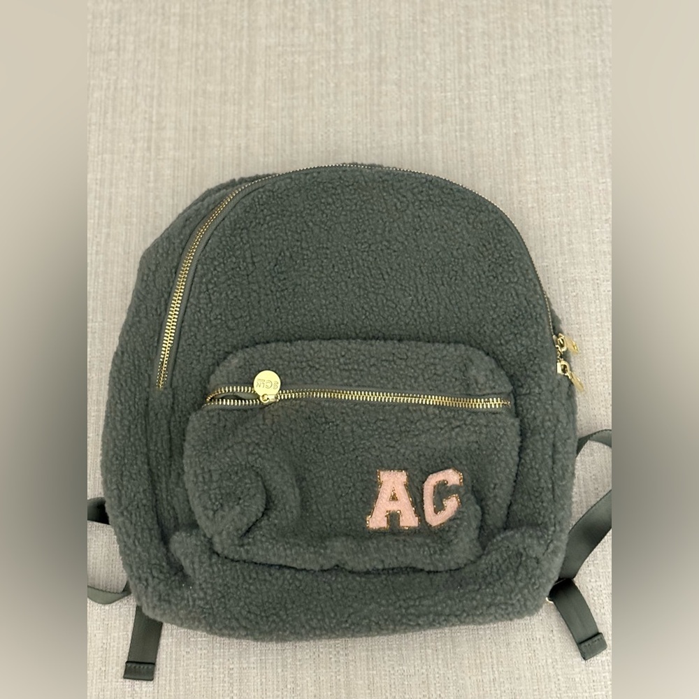 Cozy Green Sherpa Backpack with Gold Accents and Pink Lettering